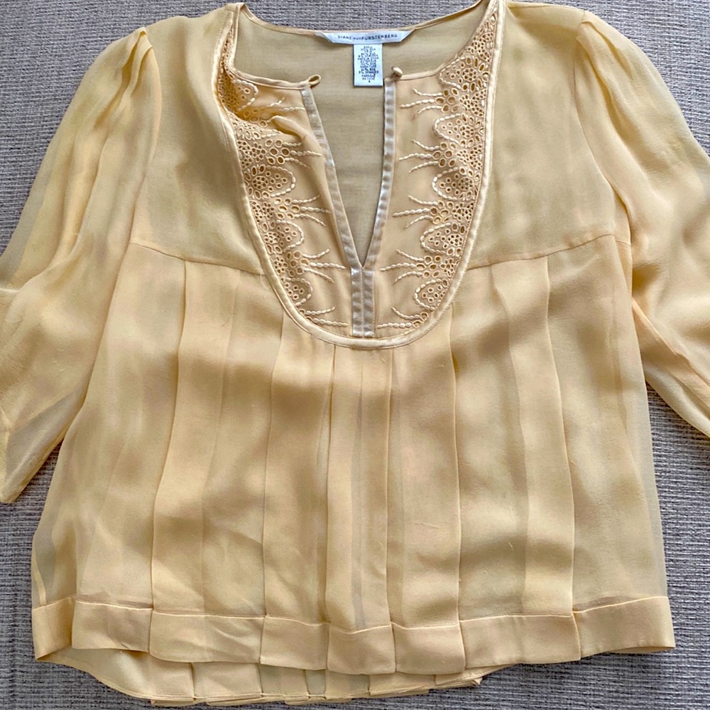 Diane von Furstenberg silk blouse. Soft yellowish/cream color.